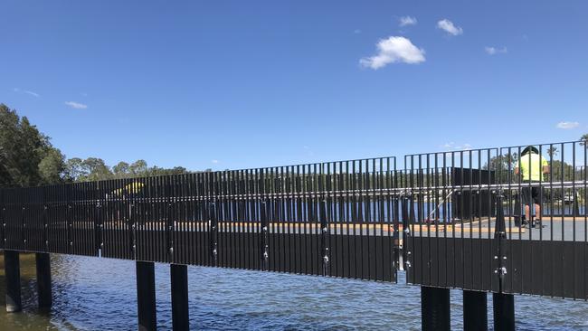 Work still underway on the new Narrabeen pedestrian and cycle bridge adjacent to the Pittwater Rd bridge across Narrabeen Lagoon. Picture: Manly Daily