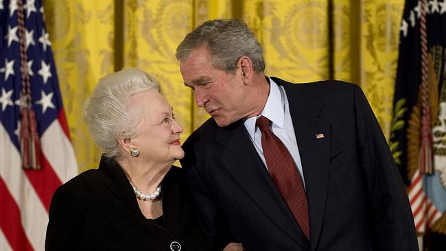 Olivia de Havilland in 2008 with then US President George W. Bush. Picture: Jim Watson / AFP