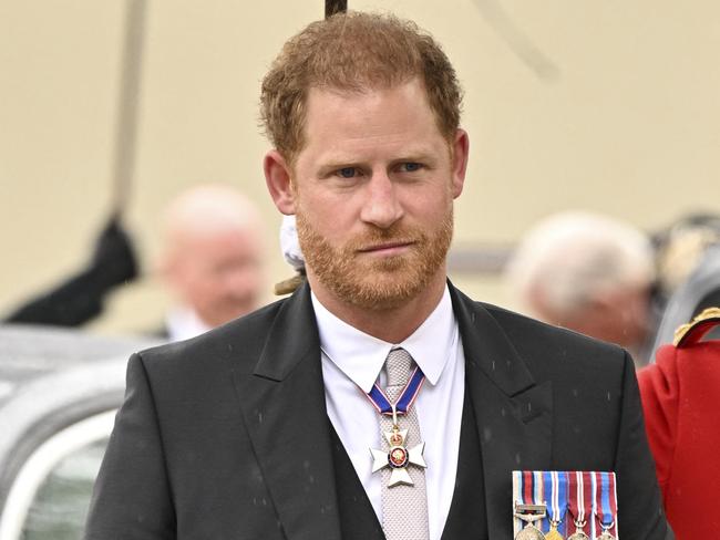 TOPSHOT - Britain's Prince Harry, Duke of Sussex arrives at Westminster Abbey in central London on May 6, 2023, ahead of the coronations of Britain's King Charles III and Britain's Camilla, Queen Consort. - The set-piece coronation is the first in Britain in 70 years, and only the second in history to be televised. Charles will be the 40th reigning monarch to be crowned at the central London church since King William I in 1066. Outside the UK, he is also king of 14 other Commonwealth countries, including Australia, Canada and New Zealand. Camilla, his second wife, will be crowned queen alongside him, and be known as Queen Camilla after the ceremony. (Photo by Andy Stenning / POOL / AFP)