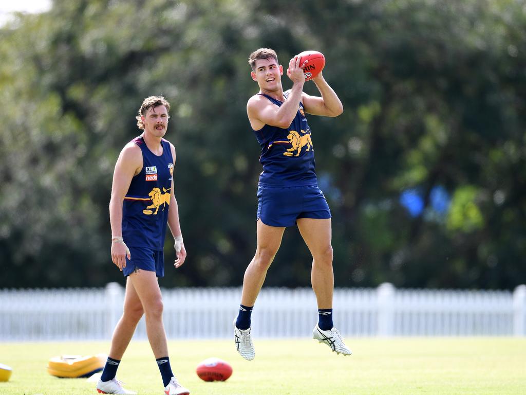 Deven Robertson (right) trains hard with fellow Lion Joe Daniher. Picture: NCA NewsWire / Dan Peled