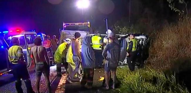 CAR ROLLOVER: Scene from the serious crash at Beerburrum overnight where a teenage driver was trapped behind the wheel. Picture: 7 News Sunshine Coast