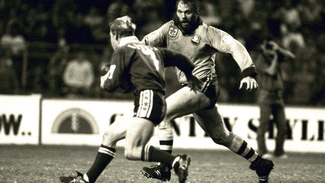 Maroons great Allan Langer tests the NSW line in his first Origin match.