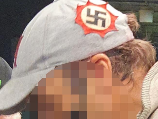 Footy fans in Melbourne have been left shocked after a man sporting Nazi swastika on his hat was spotted at Richmond train station on Friday March 19, 2021. Picture: Supplied