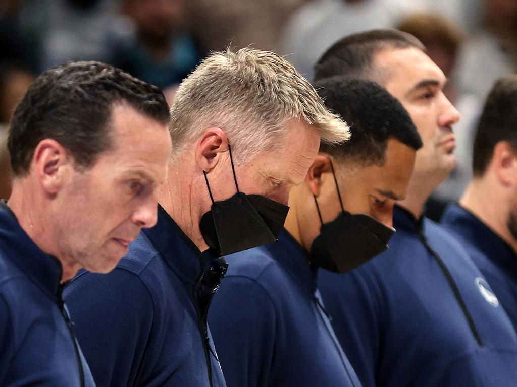 DALLAS, TEXAS - MAY 24: Head coach Steve Kerr of the Golden State Warriors stands for a moment of silence for the victims of the mass shooting at Robb Elementary School in Uvalde, TX prior to in Game Four of the 2022 NBA Playoffs Western Conference Finals against the Dallas Mavericks at American Airlines Center on May 24, 2022 in Dallas, Texas. NOTE TO USER: User expressly acknowledges and agrees that, by downloading and or using this photograph, User is consenting to the terms and conditions of the Getty Images License Agreement. (Photo by Tom Pennington/Getty Images)