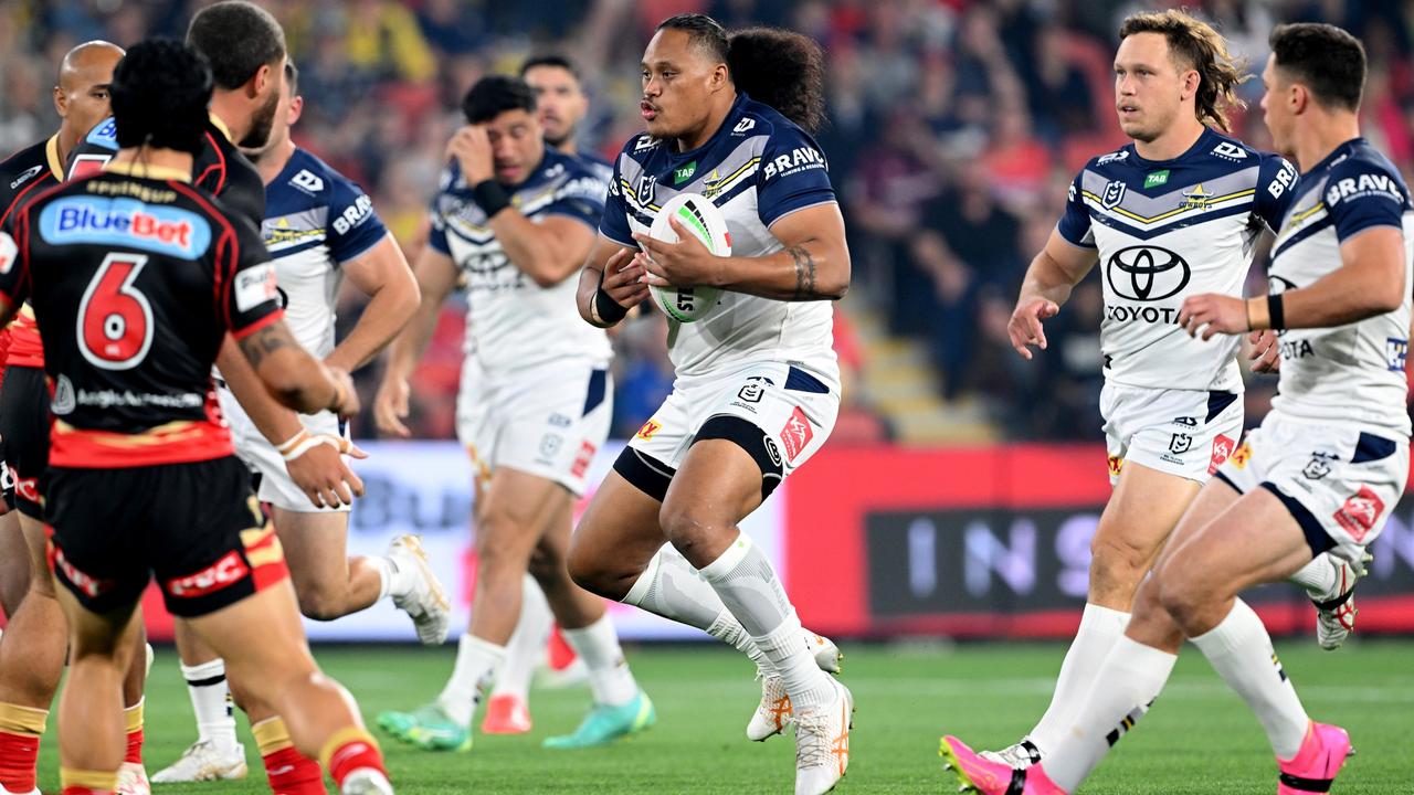 Luciano Leilua of the Cowboys looks to take on the defence. (Photo by Bradley Kanaris/Getty Images)