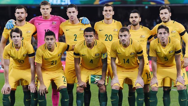 The Socceroos team pose before the Brazil clash.