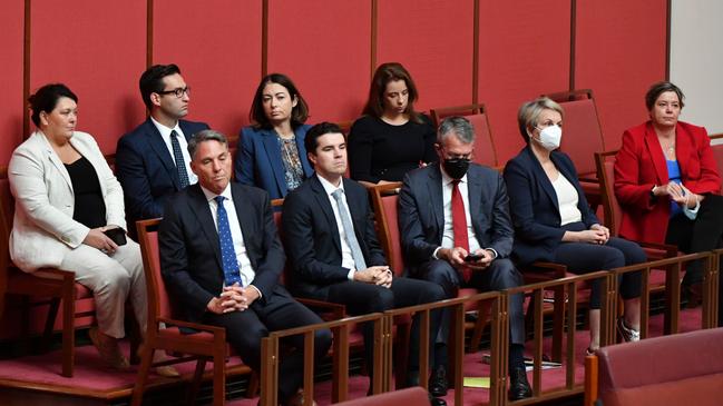 Labor members of the House of Representatives listen to the speeches of condolence. Picture: AAP