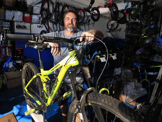 Darren Martin from Border Bikes at Tweed Heads South is being rushed off his 'pedals' with demand for bikes of all types including stationary bikes. Photo: Scott Powick Newscorp