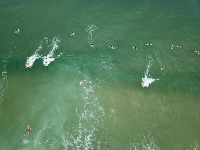 Friends and family at the paddle out at Point Cartwright, one of Nikita’s favourite spots. Picture: SUPPLIED