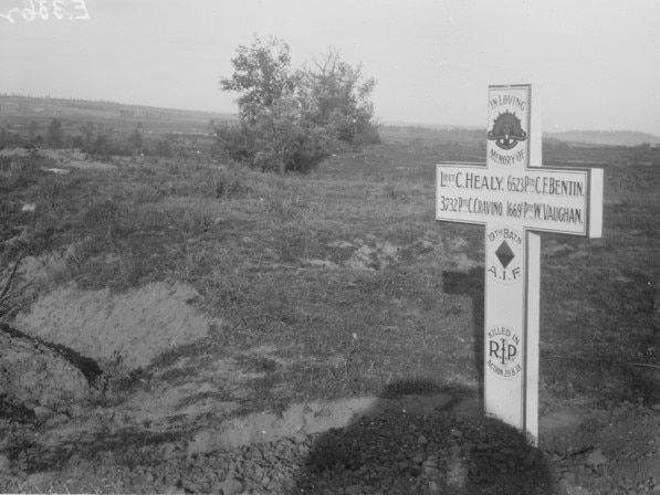 The grave of Lieutenant Cecil Healy, the Australian champion swimmer; 6523 Private (Pte) C. F. Bentin; 3732 Pte C. Cravino, and 1669 Pte W. Vaughan. Picture: Australian War Memorial No. E03362