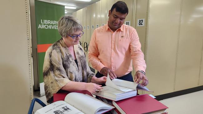 Minister Jinson Charls and senior director Library and Archives NT Tracy Puklowski. Picture: Darcy Fitzgerald