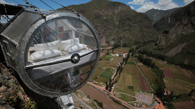 A Skylodge capsule perched on a cliff overlooking Peru’s Sacred Valley.