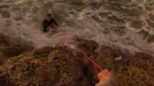 Extraordinary and terrifying footage a teenâs rescue from the ocean after slipping on rocks while fishing at Double Island Point in April 2024 has emerged, with his family saying they hoped it would save a life. Pictures: Aiden Whiteman, Whiteey's FIshing.