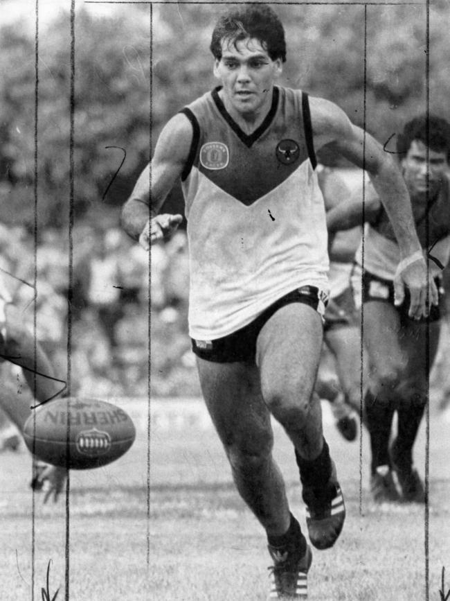 Michael Athanasiou playing centre half-back in 1987.