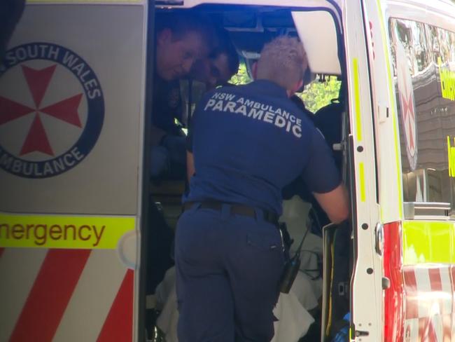 Paramedics at the scene where two children where found dead in the Blue Mountains. Picture: TNV