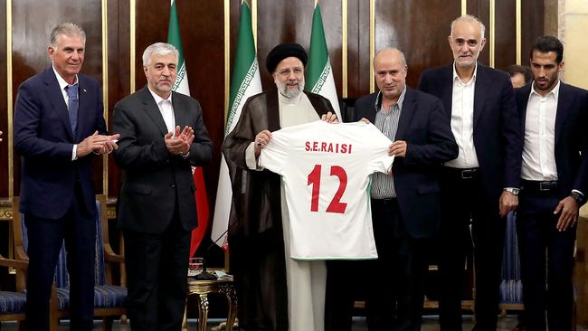 Iran's President Ebrahim Raisi meeting with members of Iran’s national soccer team at the presidential office in Tehran on November 14.