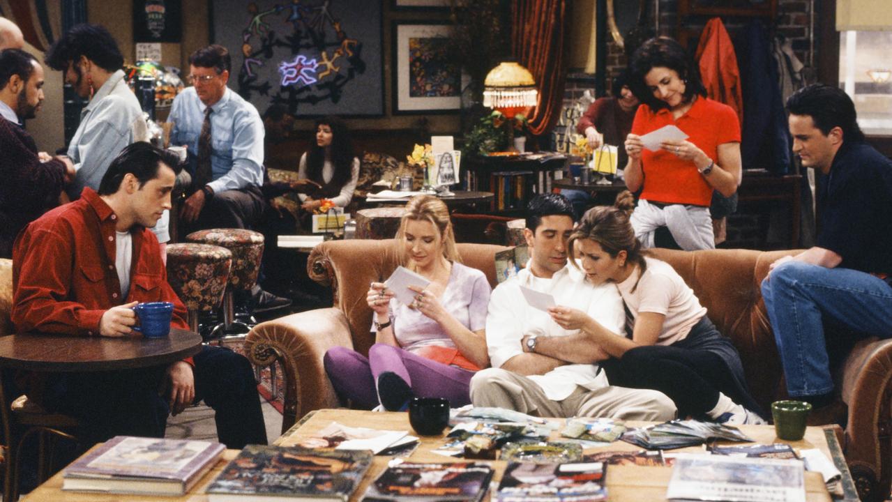 The cast at the iconic Central Perk Cafe set.