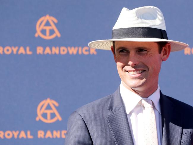 SYDNEY, AUSTRALIA - FEBRUARY 04: Trainer James Cummings receives a trophy after Race 8 Fujitsu General Eskimo Prince Stakes during Sydney Racing at Royal Randwick Racecourse on February 04, 2023 in Sydney, Australia. (Photo by Jeremy Ng/Getty Images)