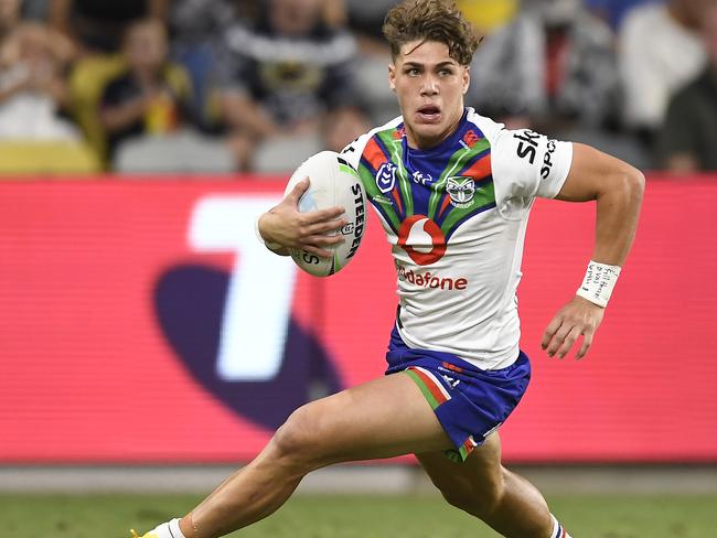 TOWNSVILLE, AUSTRALIA - MAY 28: Reece Walsh of the Warriors runs the ball during the round 12 NRL match between the North Queensland Cowboys and the New Zealand Warriors at QCB Stadium, on May 28, 2021, in Townsville, Australia. (Photo by Ian Hitchcock/Getty Images)