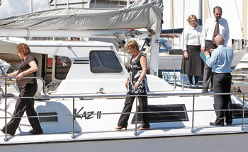 HEART-RENDING visit ... wives and family members of the three missing men on board the yacht.