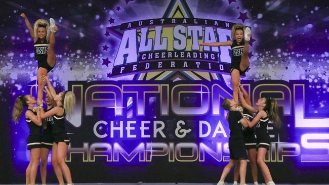 CHEERLEADING: The Coolum State School cheerleading team competing at the national championships.