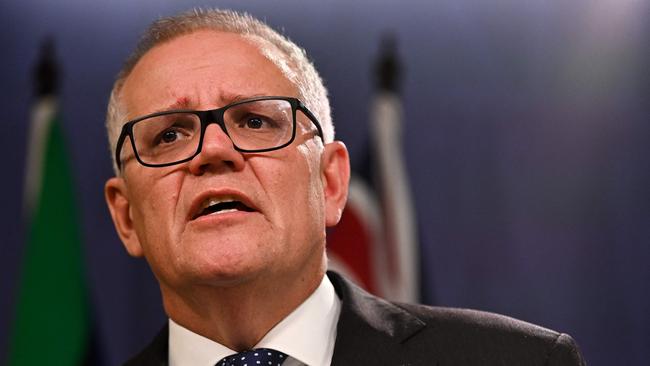 (FILES) Australia's former prime minister Scott Morrison speaks to media during a press conference in Sydney on August 17, 2022. (Photo by Steven Saphore / AFP)