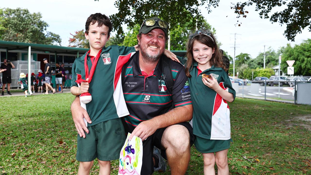 Michael Arcidiacono with his twins Hudson Arcidiacono and Isla Arcidiacono, both 6, at the Whitfield State School Father's Day activity afternoon. Picture: Brendan Radke