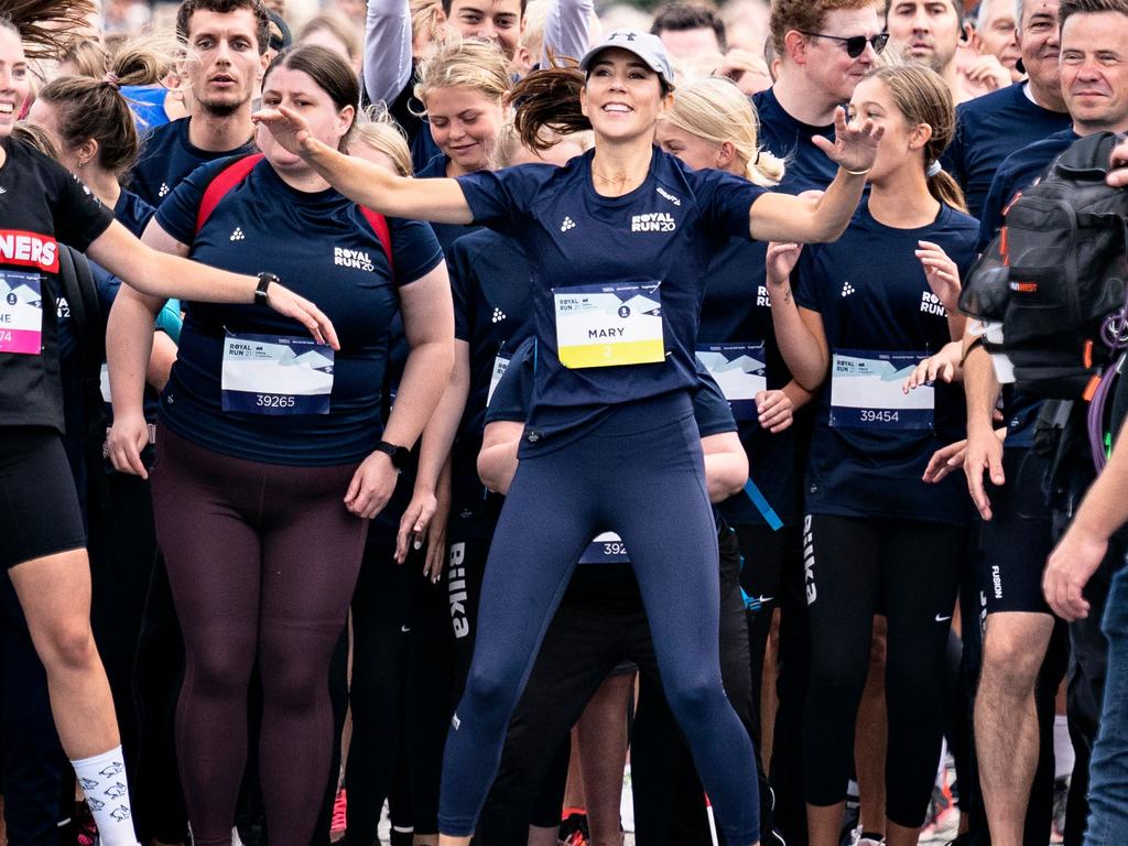 Crown Princess Mary warms up to compete in the Royal Run in Aalborg, on September 12, 2021. The running event is part of the 100th anniversary of Denmark's reunification with Southern Jutland. Picture: Henning Bagger/Ritzau Scanpix/AFP