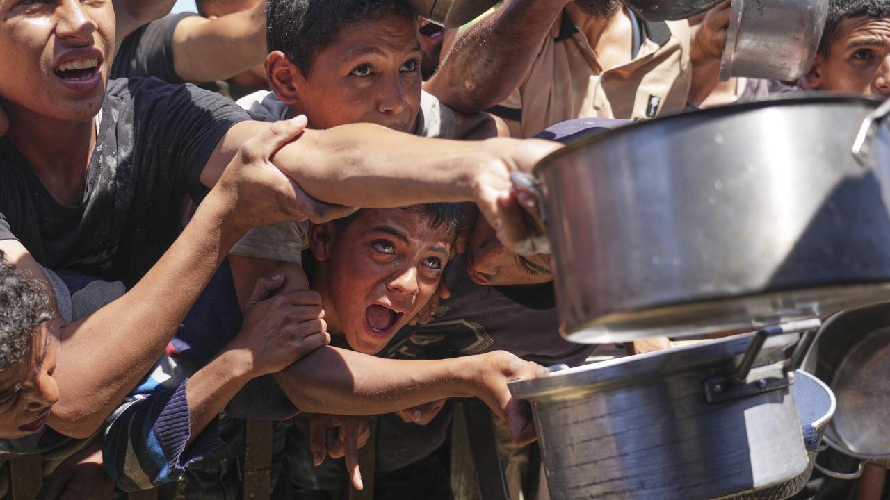 Strikes reportedly kill 60 as Israel lets in ‘teaspoon’ of aid