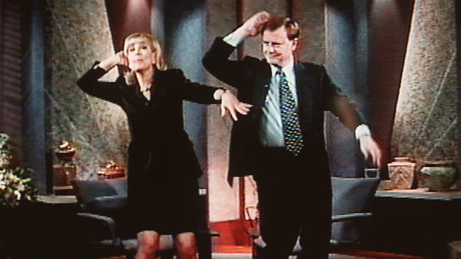 Peter Costello dancing the macarena with Kerri-Anne Kennerley.