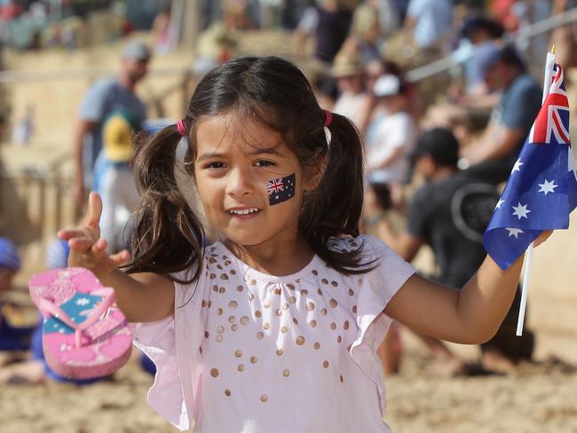 Sophie Busuttil, 4, of North Narrabeen getting in a bit of thong throwing at Dee Why beach on Australia Day 2016. Picture: Martin Lange