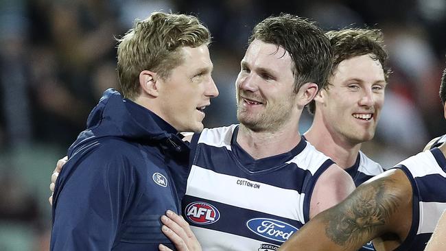 Scott Selwood with Patrick Dangerfield after Geelong’s win. Picture: Sarah Reed