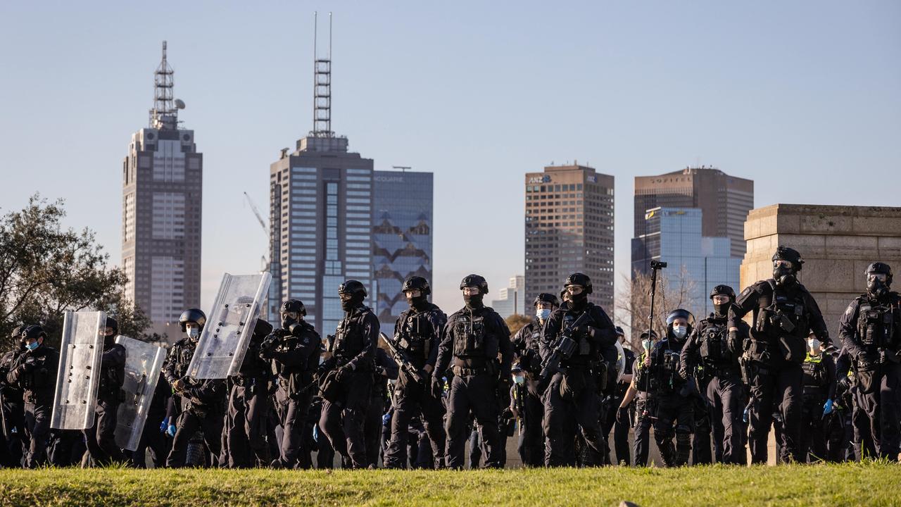 A wall of riot police near the Shrine. Picture: Jason Edwards