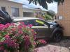 Woman taken to hospital after crashing into building