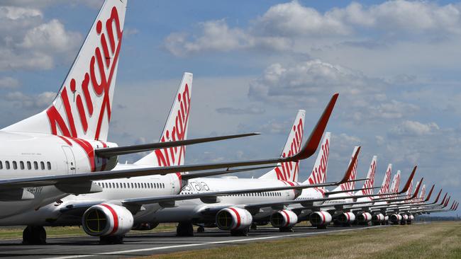 Grounded Virgin Australia aircraft parked at Brisbane Airport. Picture: Darren England