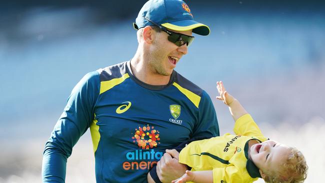 Australian captain Tim Paine with his son Charlie at the MCG on Christmas Day Picture: AAP