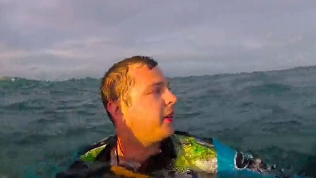 RACQ Cq Rescue crew with Ryan Taylor, Mitch Cook and Sean Cook after their dramatic rescue off the Mackay coast on Friday when the trio's boat sank about 18km from shore. Pictures: RACQ CQ Rescue