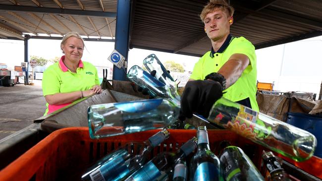 AAA Recycling manager Krystie Paltridge with worker Jay Couzen sorting bottles. Picture: NCA NewsWire / Kelly Barnes