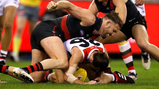 Cale Hooker swings a punch at Daniel McKenzie.