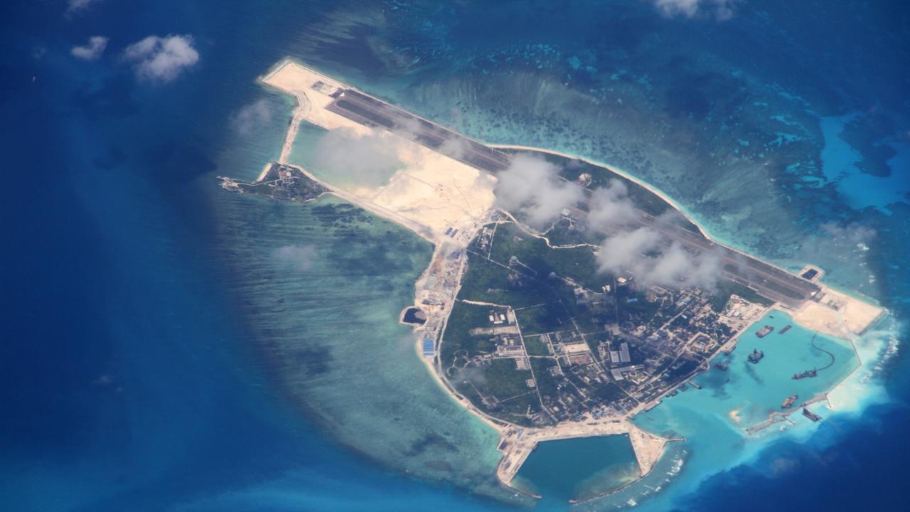 Recent satellite images confirmed China has been basing illegal military weapons on its artificial islands.