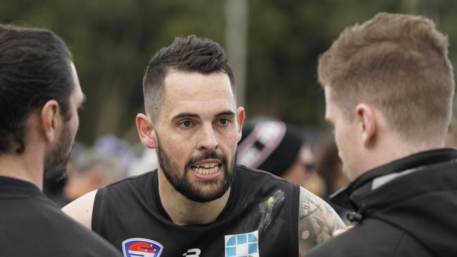 Southern league Division 4 footy grand final: Frankston Dolphins v Lyndhurst. Frankston coach Richard Mathers addressing players. Picture: Valeriu Campan