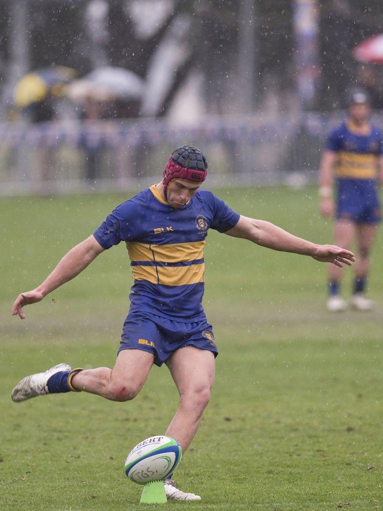 Hamish Stewart kicks for Grammar during the 2015 O’Callaghan Cup. Picture: Nev Madsen