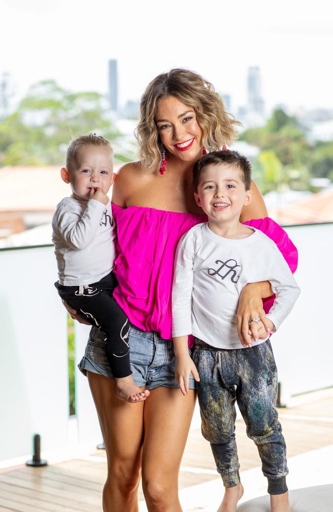 Erin McNaught moved her family back home to Brisbane last year after seven years in the UK. Pictured with her sons Ennio and Evander. Picture by Luke Marsden.