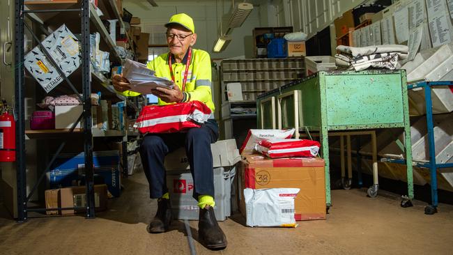 Laidley Post Office contractor Harold Schulz, sorts through some mail. PHOTO: ALI KUCHEL