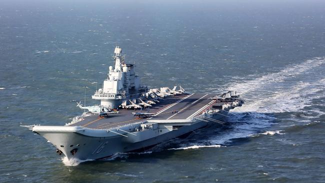 A Chinese aircraft carrier during military drills in the Pacific. Picture: AFP