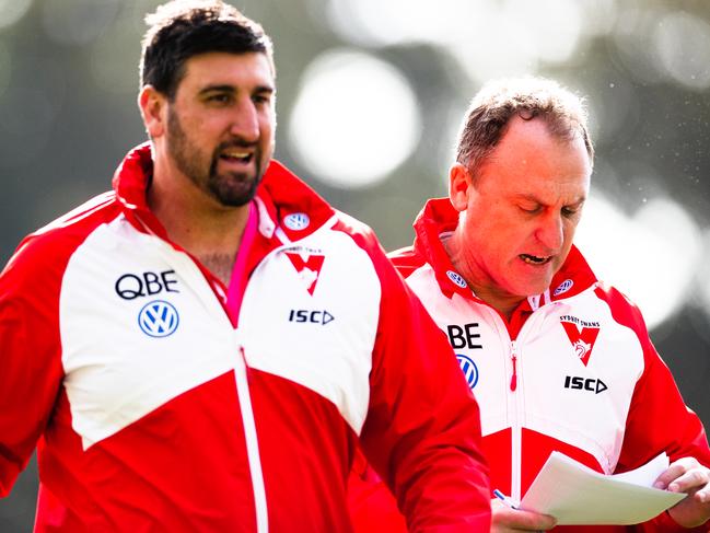 ADELAIDE, AUSTRALIA - AUGUST 10: John Longmire, Senior Coach of the Swans and assistant Dean Cox walk from the ground during the round 21 AFL match between the Port Adelaide Power and the Sydney Swans at Adelaide Oval on August 10, 2019 in Adelaide, Australia. (Photo by Daniel Kalisz/Getty Images)