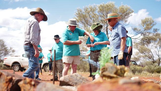 Group effort: Trevor Tough with volunteers from Outback Graves. Pictures: Samille Mitchell