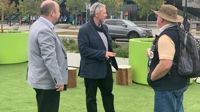 Landcom GM Scott Gregg (middle) with residents enjoying the new temporary pocket park at Tallawong Station.