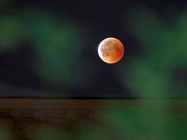 This picture shows the "blood moon" eclipse in Berlin's Kreuzberg district. Picture: AFP