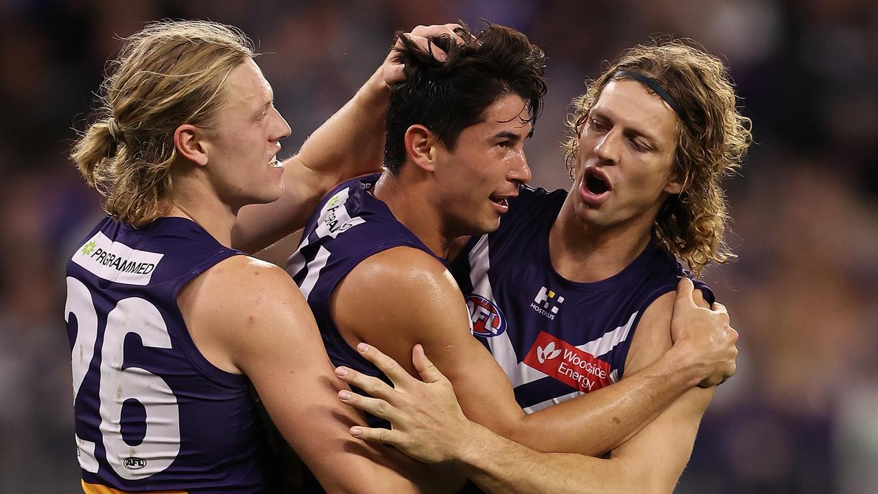 PERTH, AUSTRALIA - APRIL 27: Bailey Banfield of the Dockers celebrates a goal during the round seven AFL match between Fremantle Dockers and Western Bulldogs at Optus Stadium, on April 27, 2024, in Perth, Australia. (Photo by Paul Kane/Getty Images)